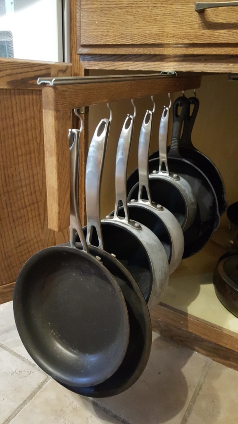 Avoid a Cluttered Kitchen Cabinet By Hanging Up Pots and Pans | imgur.com/gadawg5