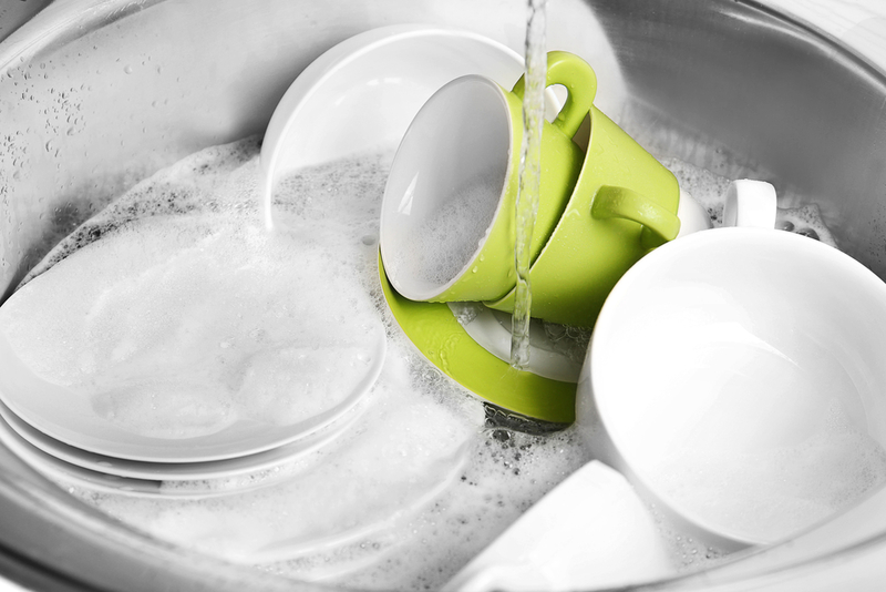 Greener Dishwashing: Is Handwashing Better Than Using The Dishwasher? | Shutterstock