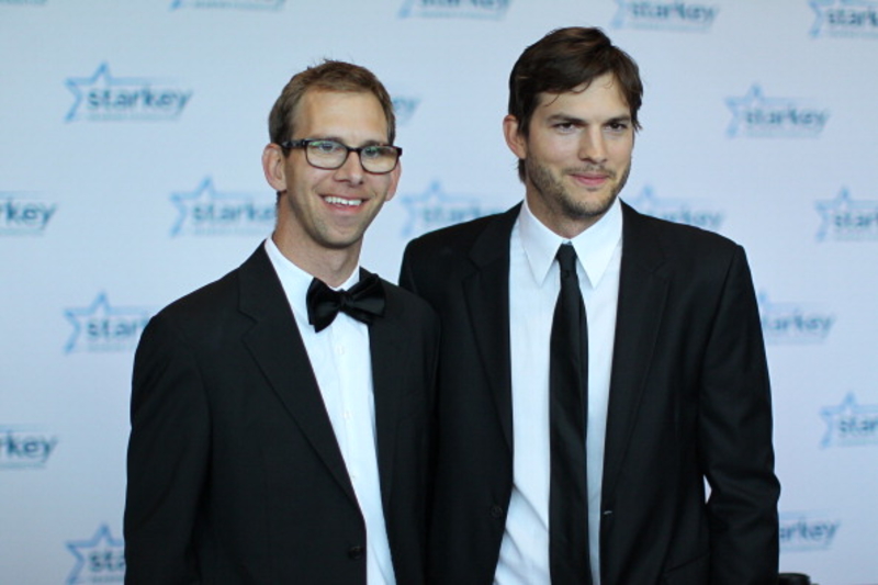 Ashton Kutcher and Michael Kutcher | Getty Images Photo by Adam Bettcher