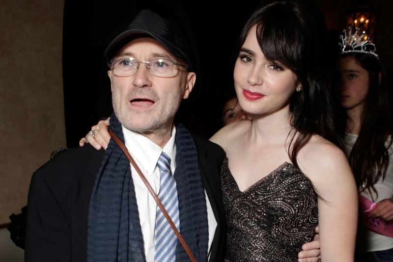 Phil Collins und Lily Collins | Getty Images Photo by Todd Williamson