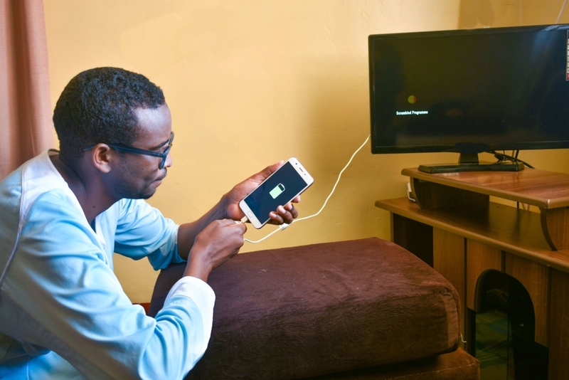 TV to Phone Charging | Alamy Stock Photo
