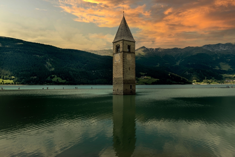 A Partially Submerged Bell Tower in Graun, Italy | Alamy Stock Photo by camilla66 