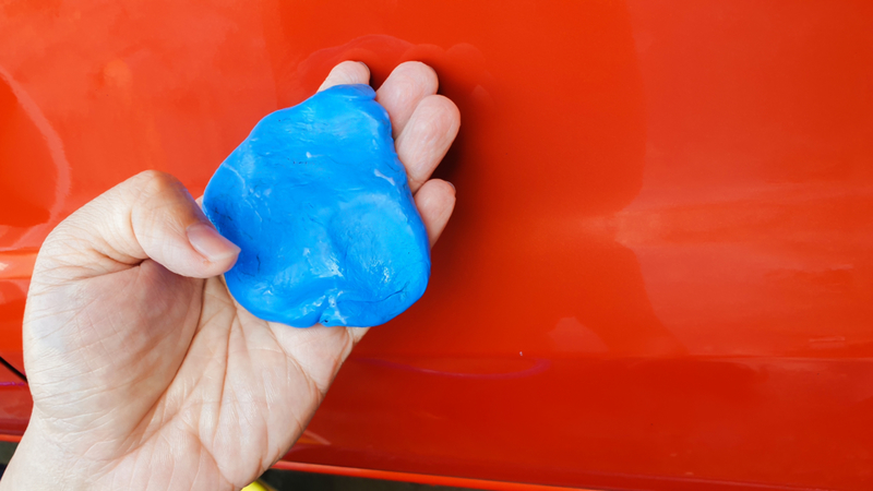 Use a Clay Bar to Remove Stubborn Grease Stains | Shutterstock