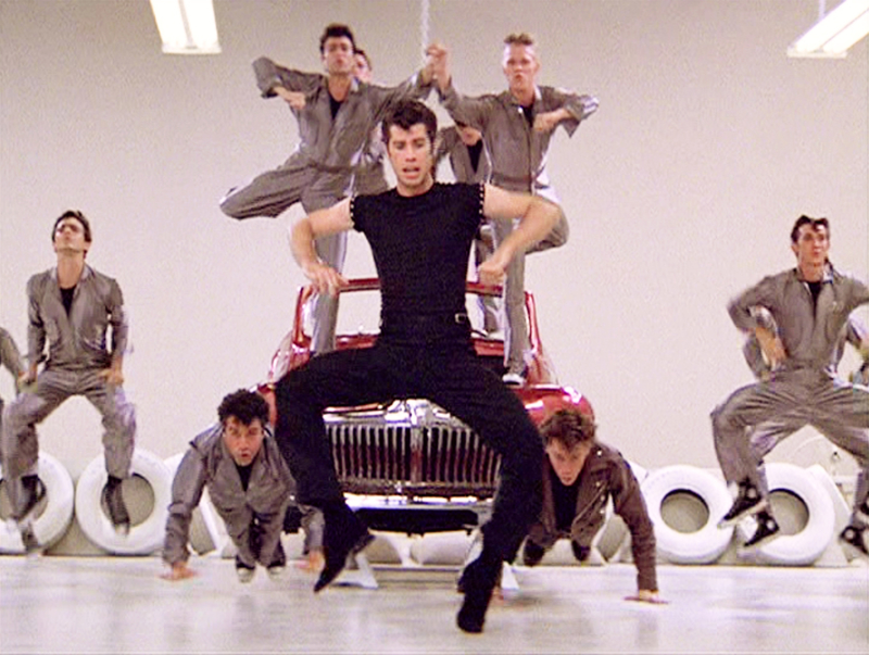 “Greased Lightning” by John Travolta | Getty Images Photo by CBS 
